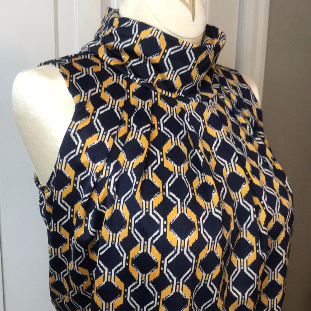 Beautiful high neck sleeveless blouse!